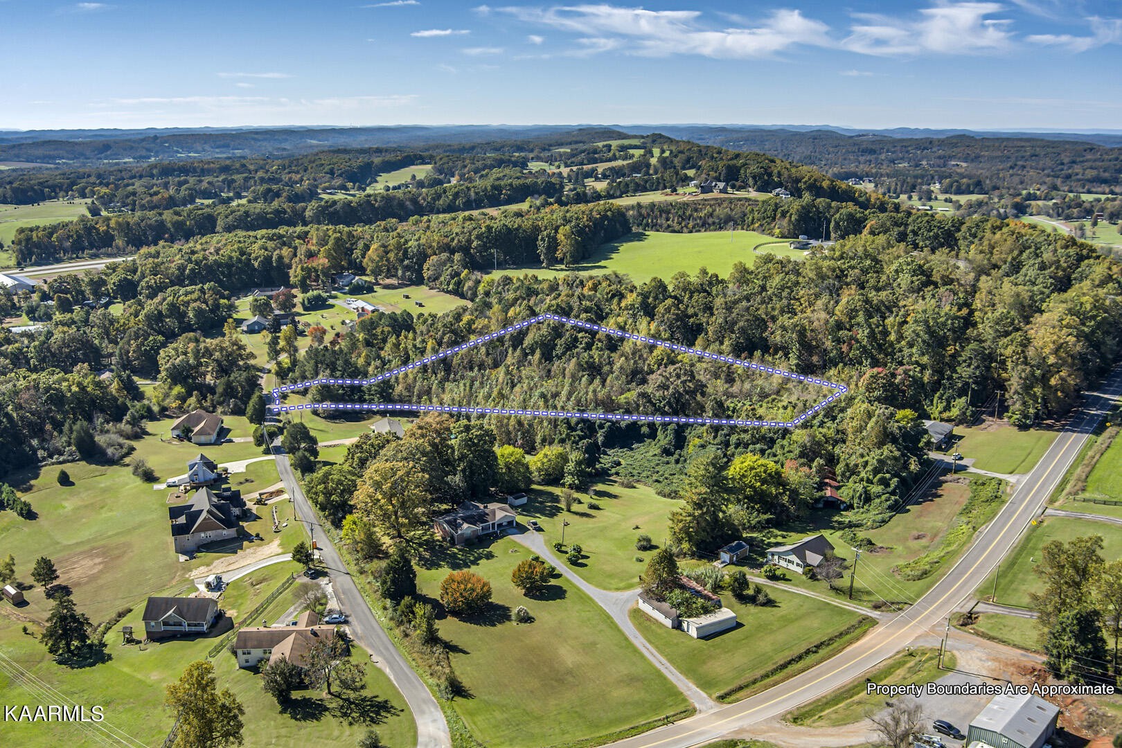 0 County Road 124 Athens, TN 37303 - Photo 6 of 13 an aerial view of residential houses with outdoor space