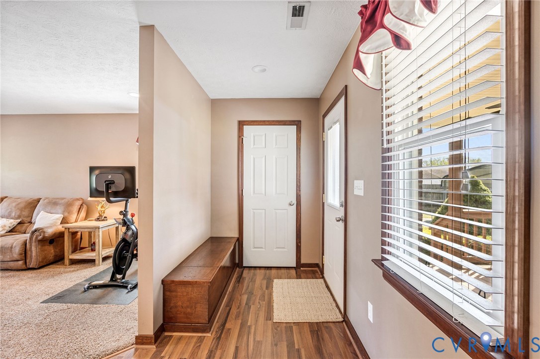 3411 Spring Run Road Mechanicsville, VA 23111 - Photo 26 of 41 a view of a bedroom with workspace and a window