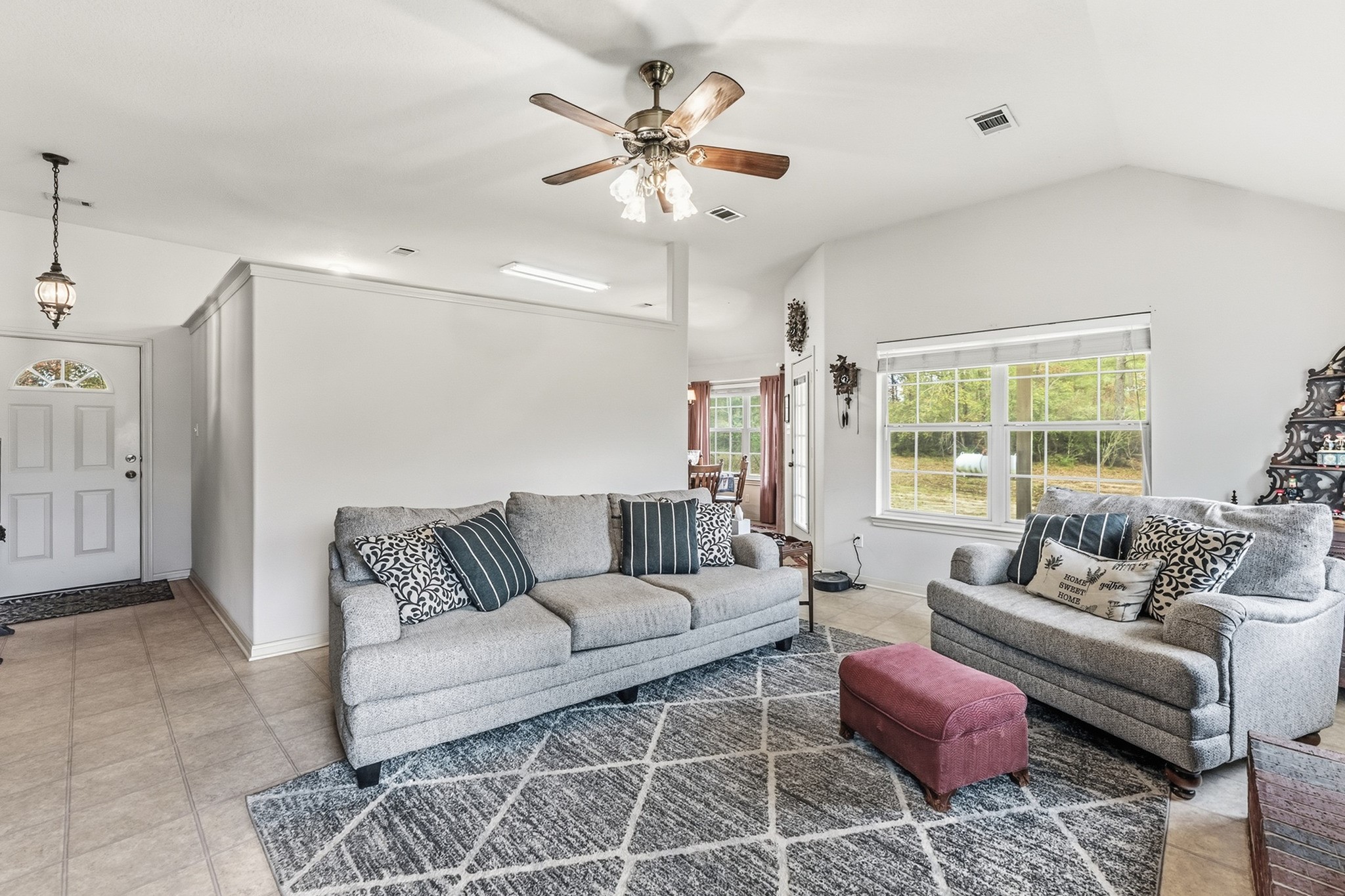 691 Bishop Road Huntsville, TX 77320 - Photo 6 of 32 a living room with furniture and a large window