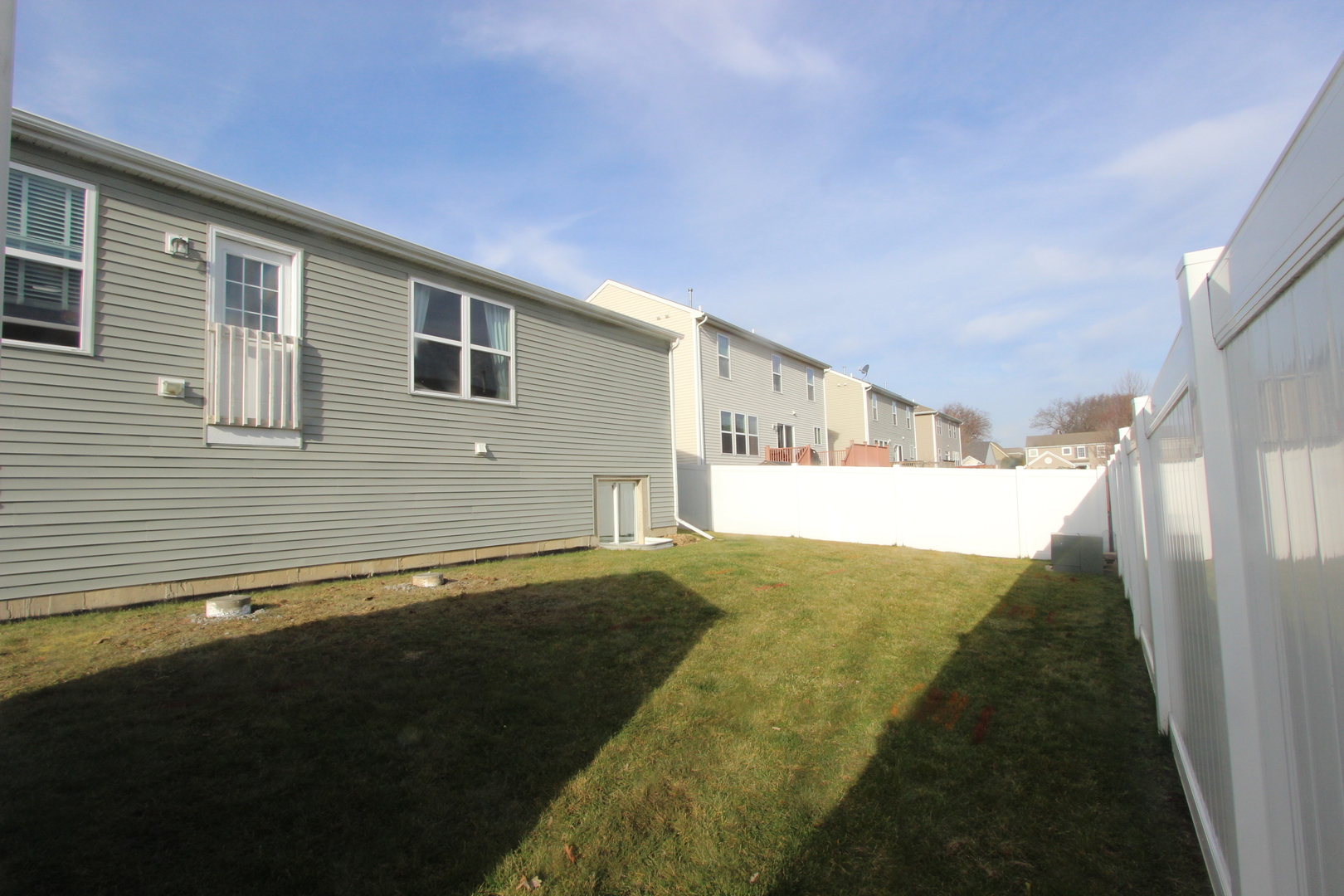 1856 Butterfield Road Woodstock, IL 60098 - Photo 23 of 26 a view of backyard of a house