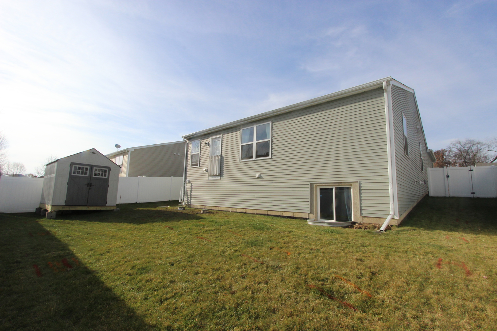 1856 Butterfield Road Woodstock, IL 60098 - Photo 25 of 26 a view of a house with backyard
