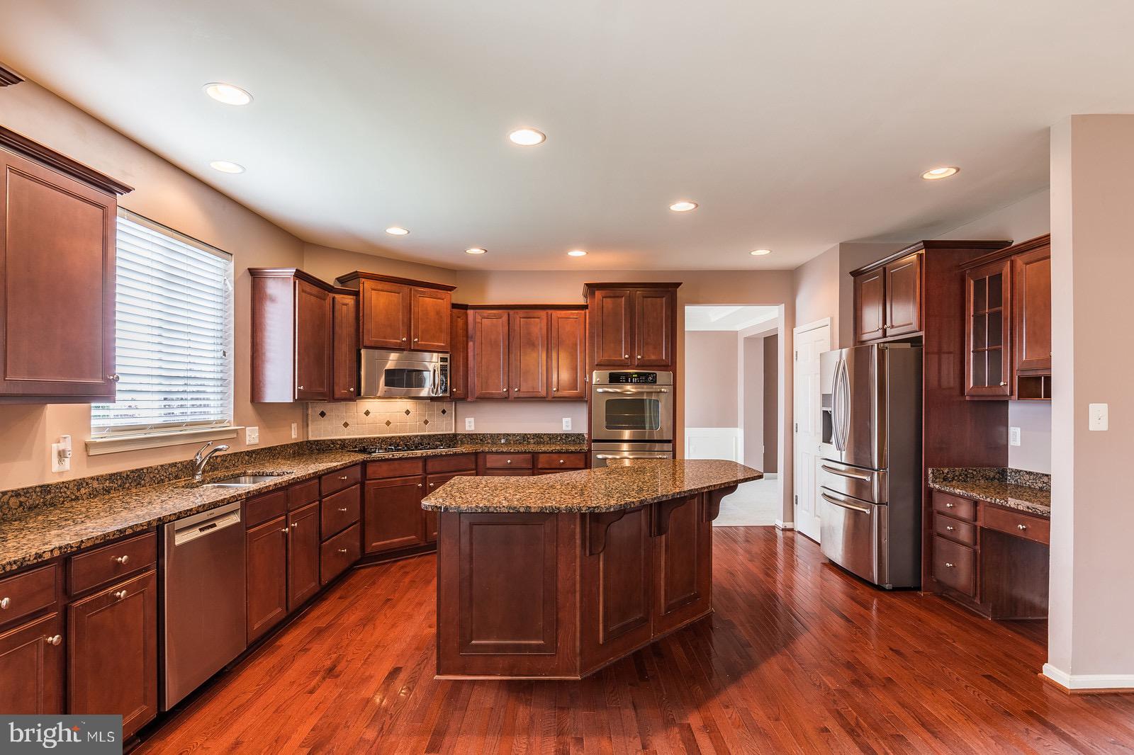 403 Woodrow Road Winchester, VA 22602 - Photo 6 of 51 Kitchen W/ Granite Counter Tops, SS Appliances
