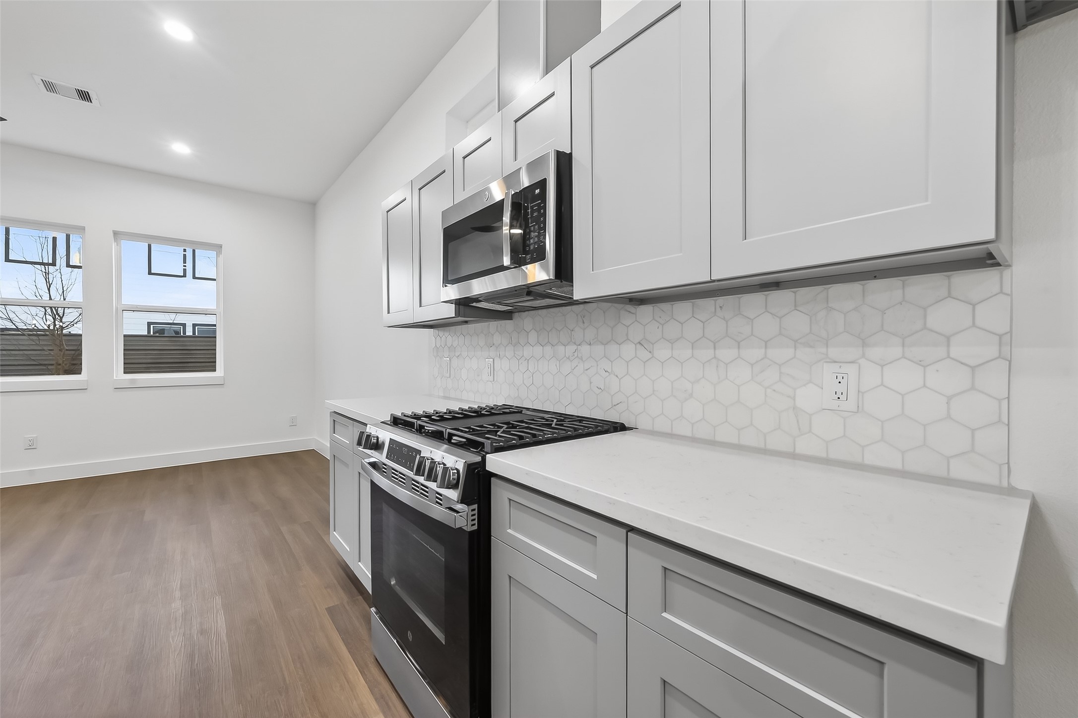 3514 Good Hope Street, Unit B Houston, TX 77021 - Photo 6 of 26 Sleek kitchen featuring modern stainless steel appliances.