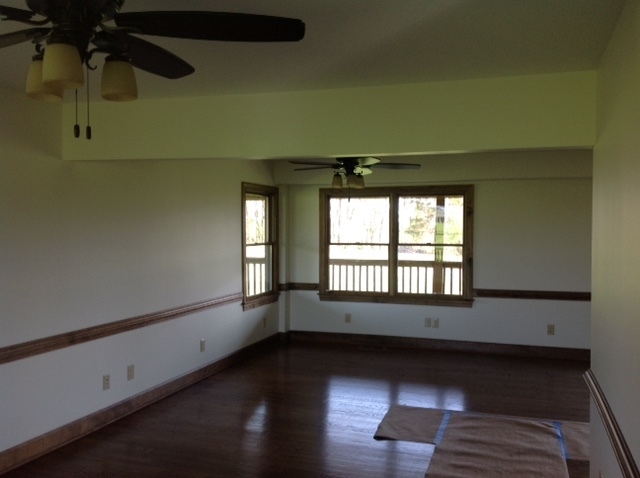 8675 East Timber Ridge Road Mount Crawford, VA 22841 - Photo 4 of 30 an empty room with wooden floor and windows