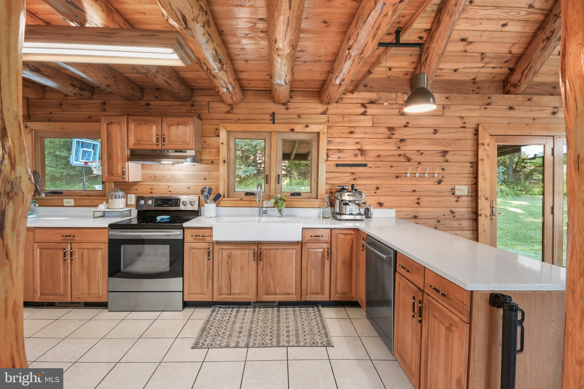 4107 Baker Valley Road Frederick, MD 21704 - Photo 11 of 40 Kitchen overlooks rear yard, slider opens to porch
