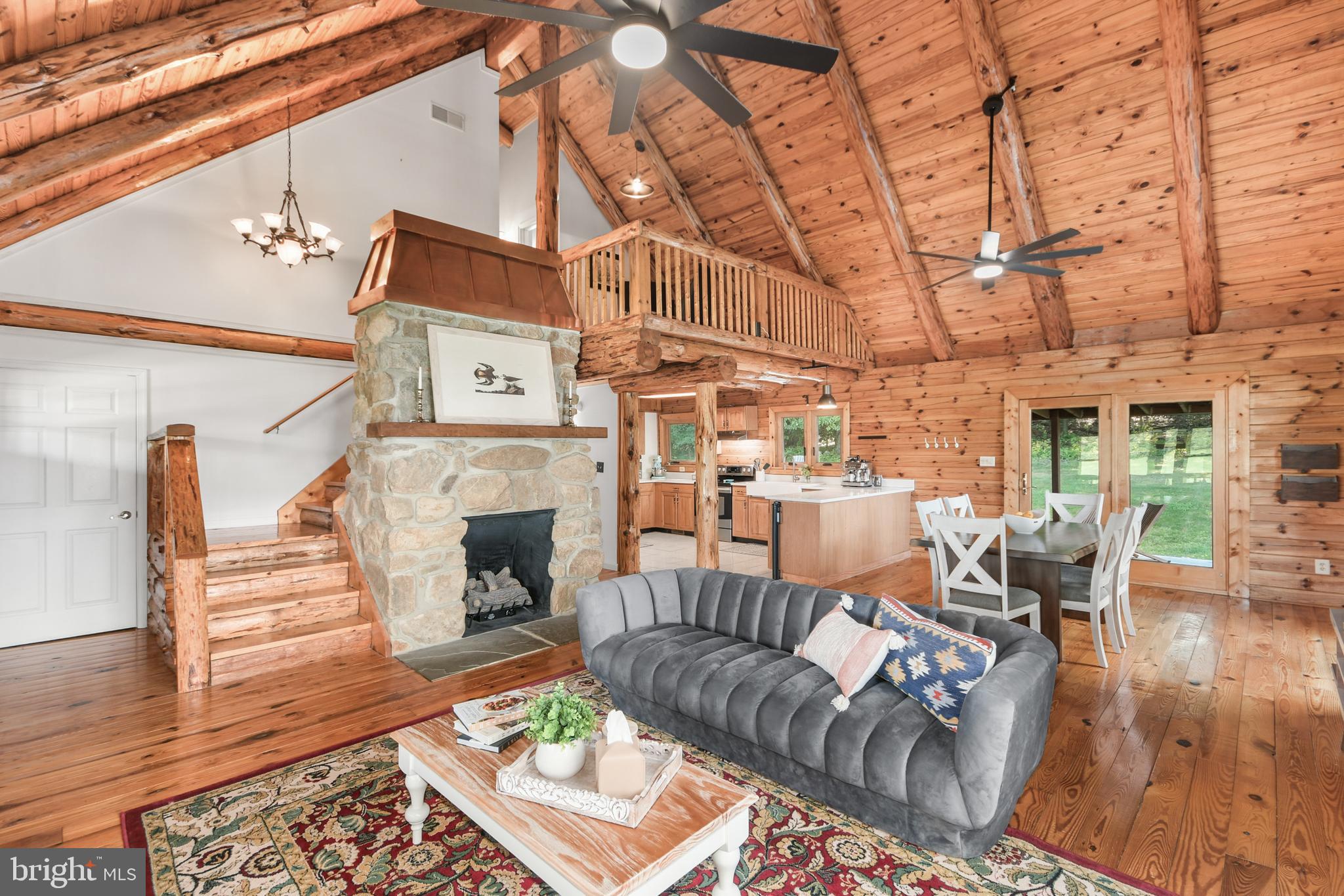 Vaulted ceilings, natural light & gorgeous floors.