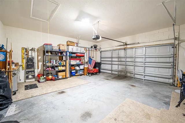 a view of a garage with storage