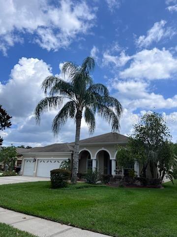 4606 Kilcoyne Court Lutz, FL 33558 - Photo 1 of 1 Front yard and landsca;ing