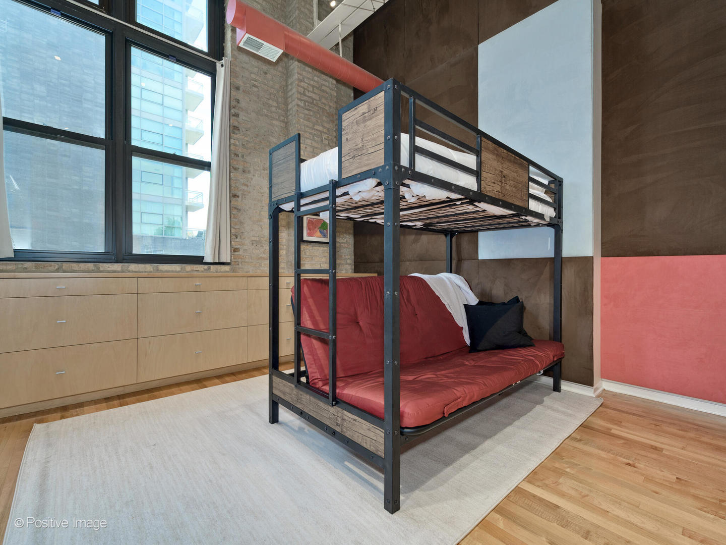 203 South Sangamon Street, Unit 213 Chicago, IL 60607 - Photo 16 of 23 a view of a living room with a bed and a window