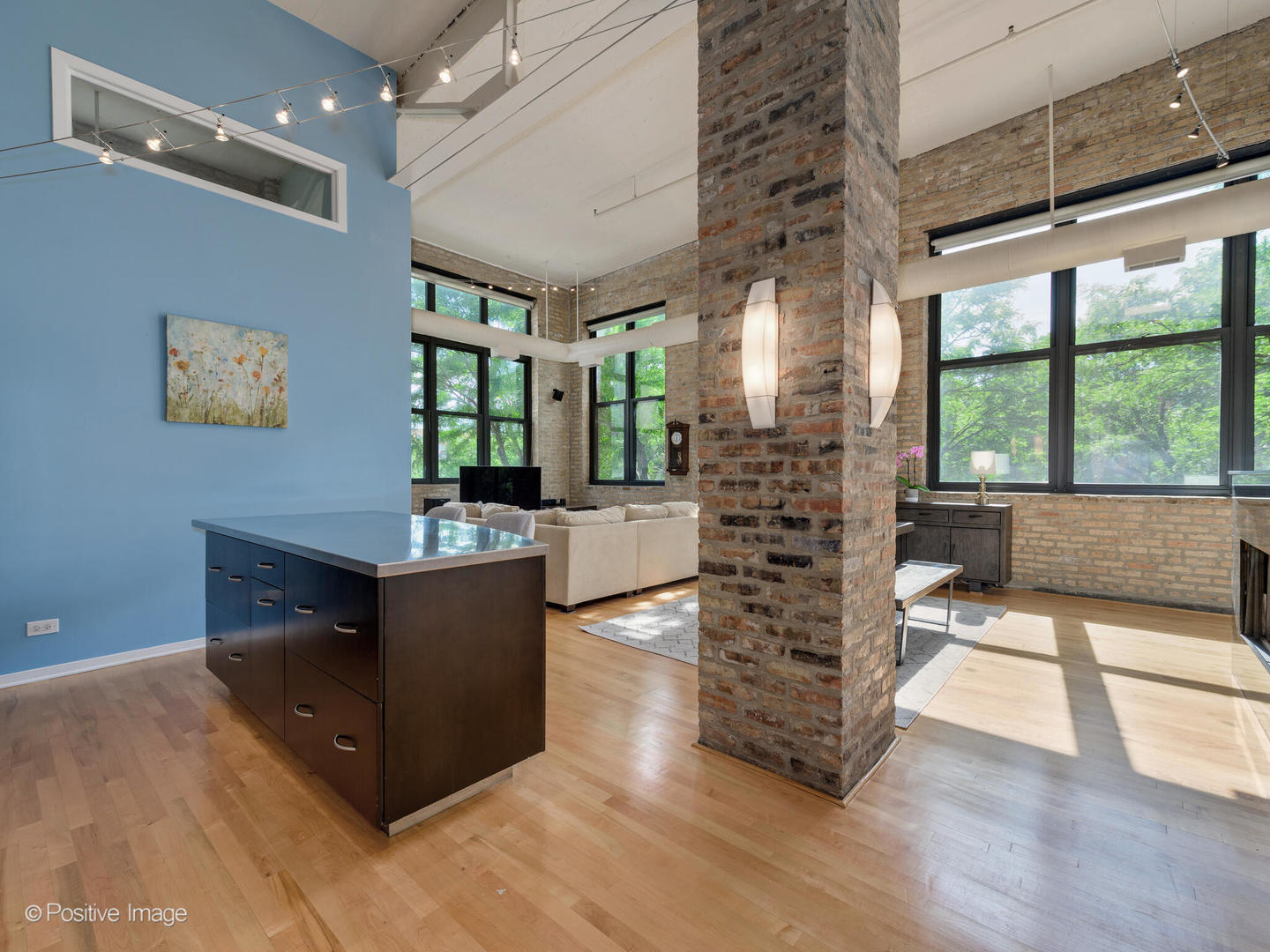 203 South Sangamon Street, Unit 213 Chicago, IL 60607 - Photo 6 of 23 a living room with furniture and large windows