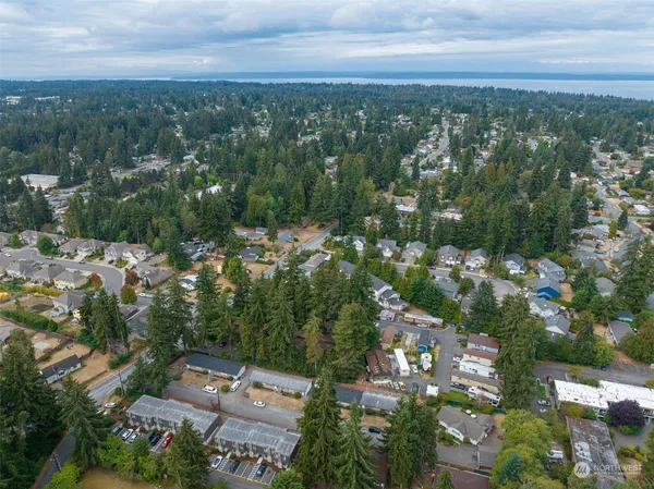 an aerial view of a city with lots of residential buildings