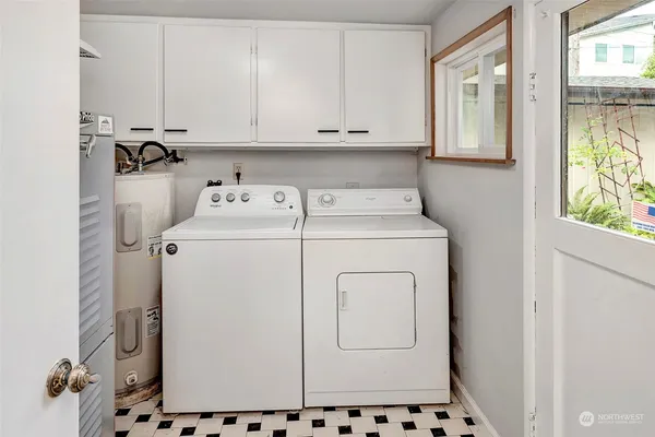 a utility room with dryer and washer