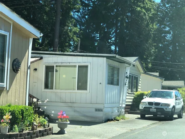 a car parked in front of a house