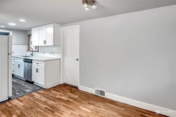 a view of a kitchen with a sink