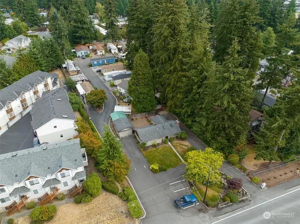 an aerial view of a house with a garden