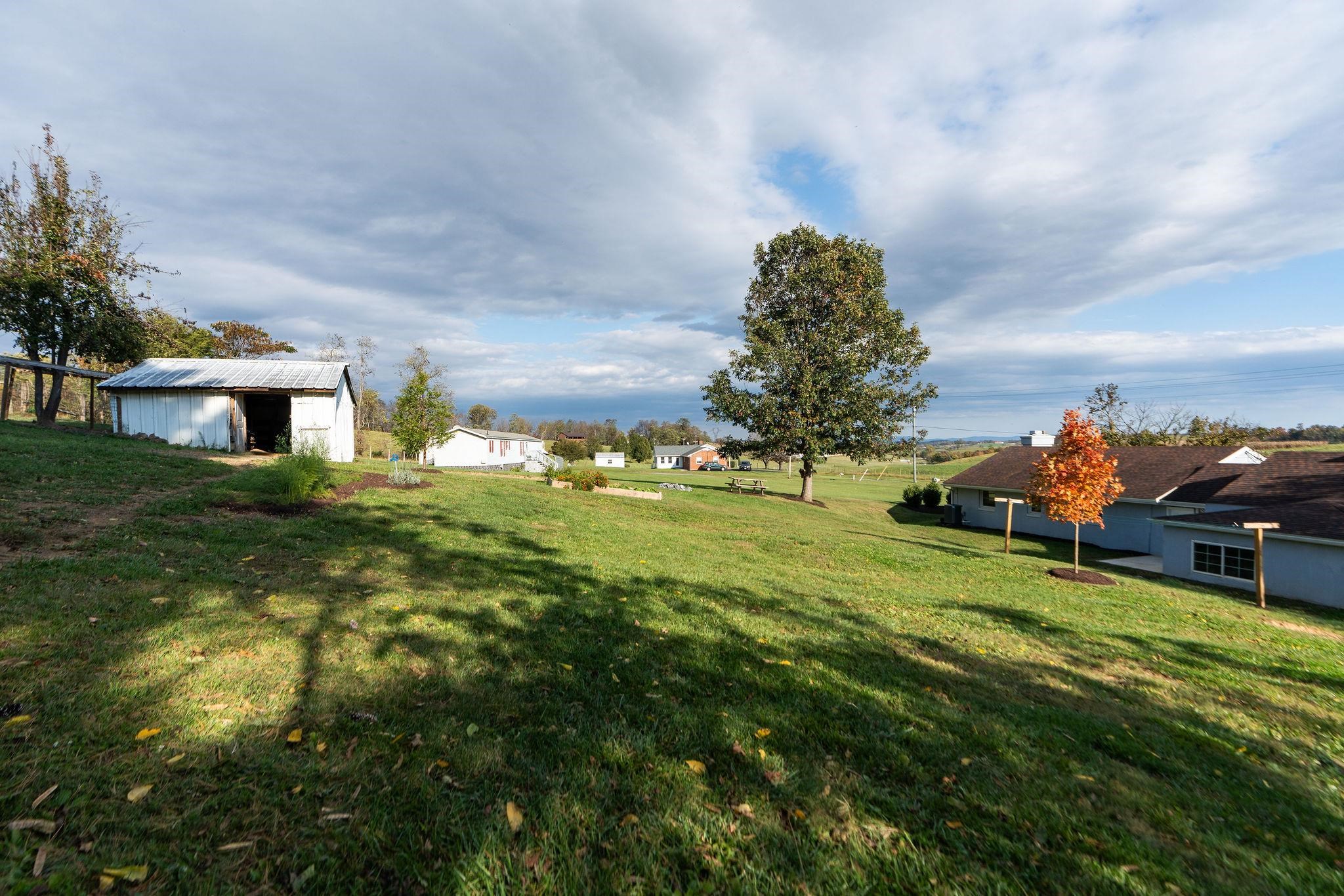 1111 Jennings Gap Road Churchville, VA 24421 - Photo 17 of 75 a swimming pool with trees in the background