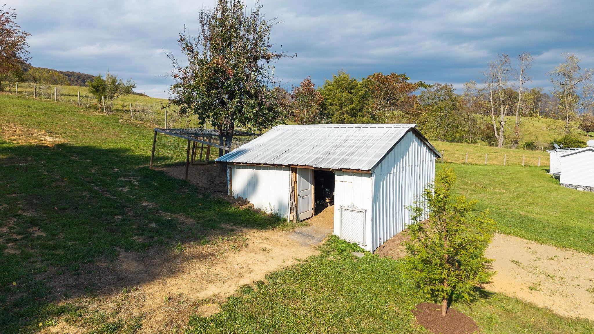 1111 Jennings Gap Road Churchville, VA 24421 - Photo 40 of 75 a view of a house with a yard and lake view