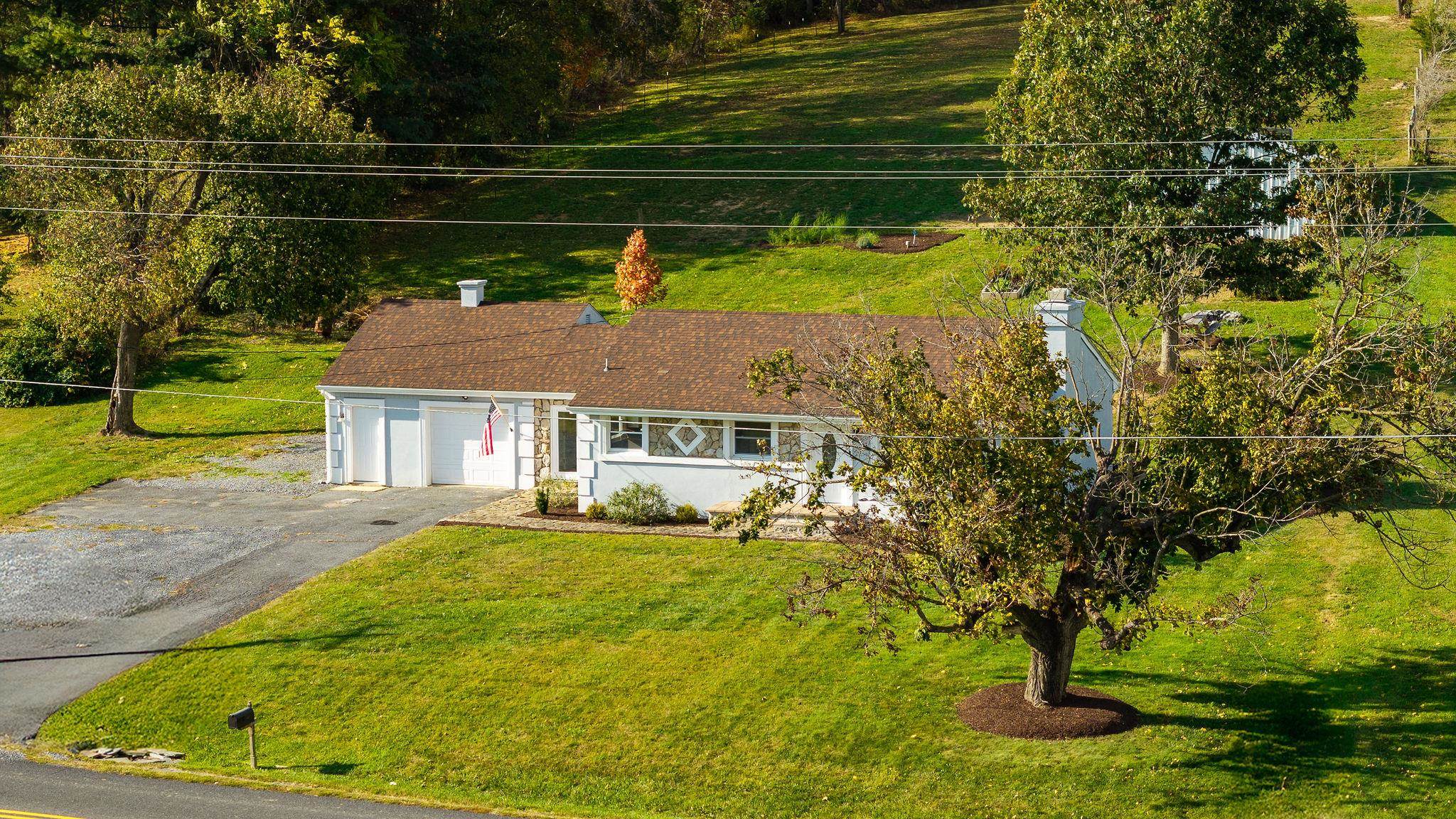 1111 Jennings Gap Road Churchville, VA 24421 - Photo 52 of 75 a view of a house with a yard