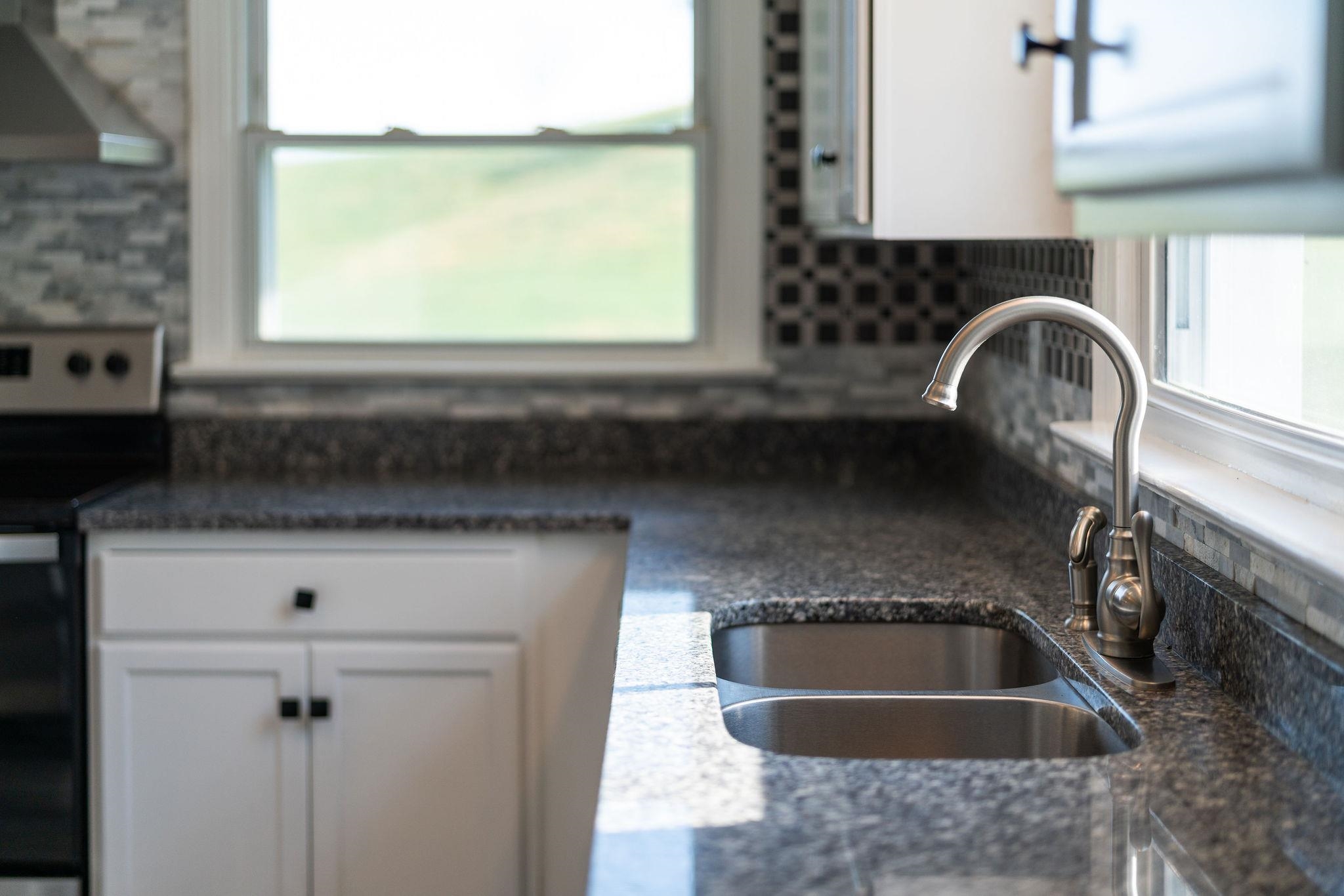 1111 Jennings Gap Road Churchville, VA 24421 - Photo 71 of 75 a kitchen with a sink a stove and cabinets