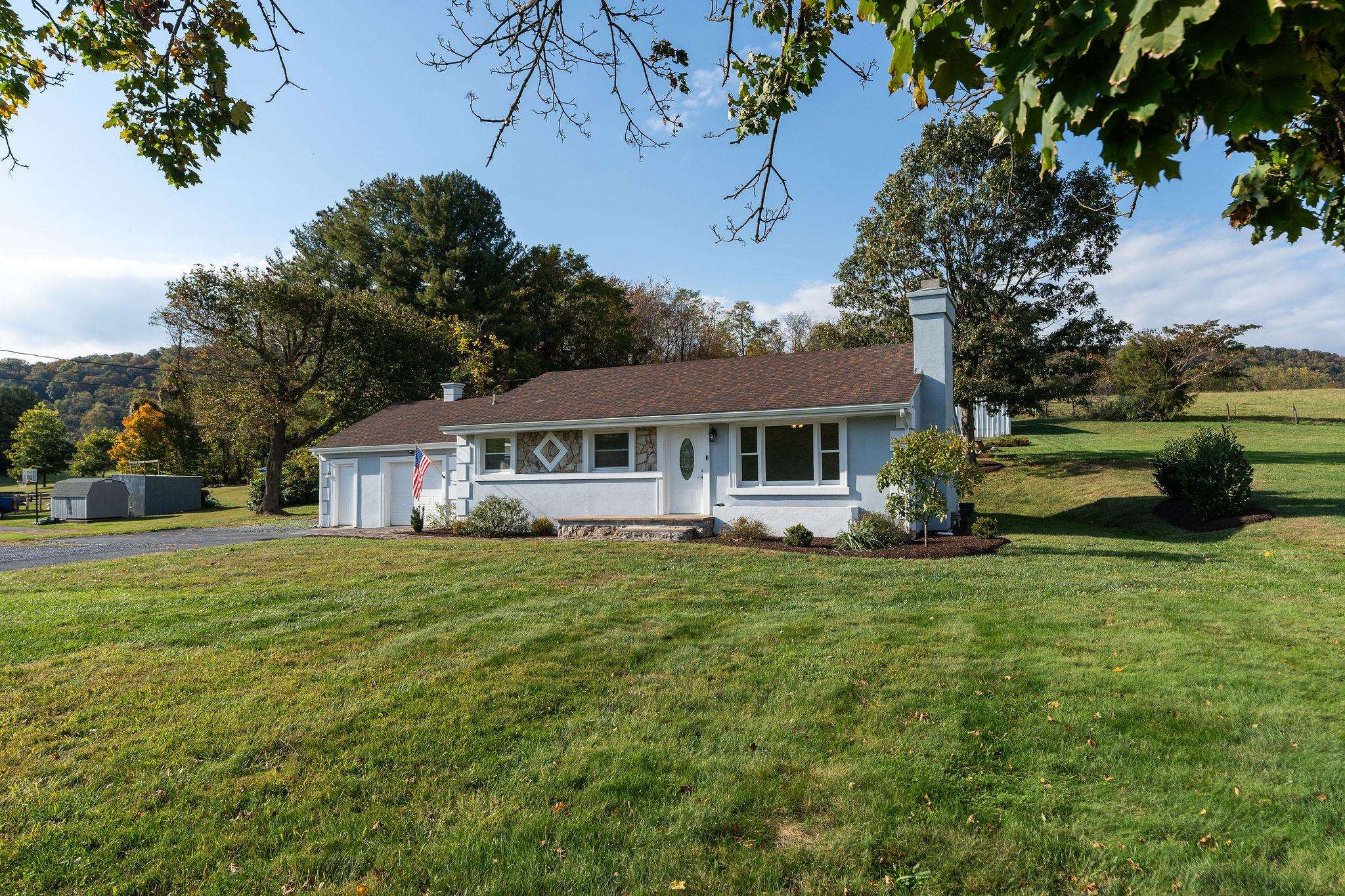 1111 Jennings Gap Road Churchville, VA 24421 - Photo 8 of 75 a front view of a house with a garden
