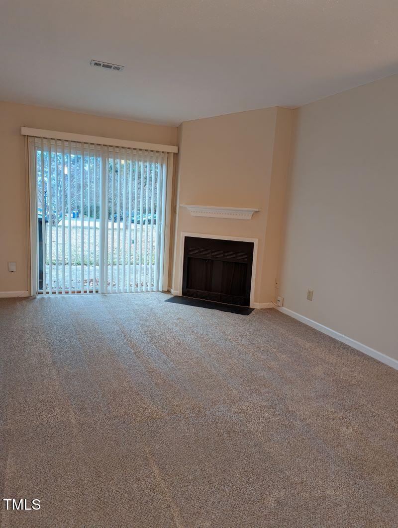 2616 Stewart Drive, Unit C Raleigh, NC 27603 - Photo 8 of 25 Living Room to Patio