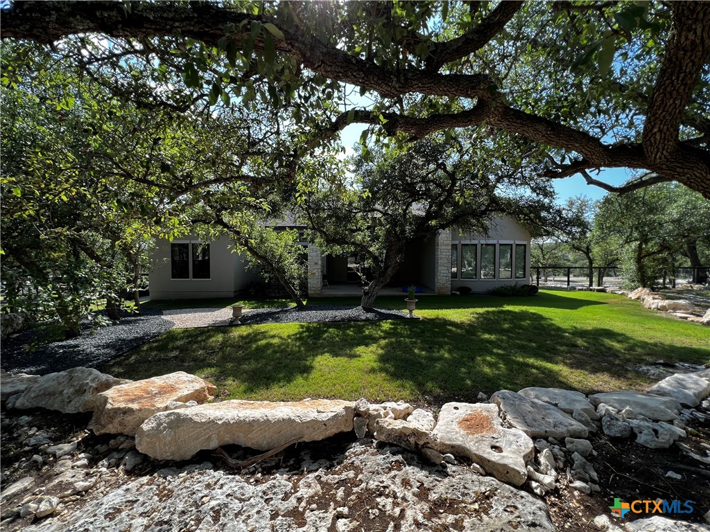 407 Havasu Point Spring Branch, TX 78070 - Photo 13 of 36 a view of backyard with outdoor space