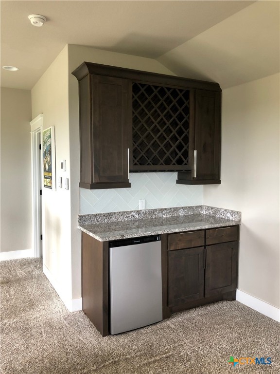 407 Havasu Point Spring Branch, TX 78070 - Photo 15 of 36 a kitchen with stainless steel appliances granite countertop a stove and a cabinets