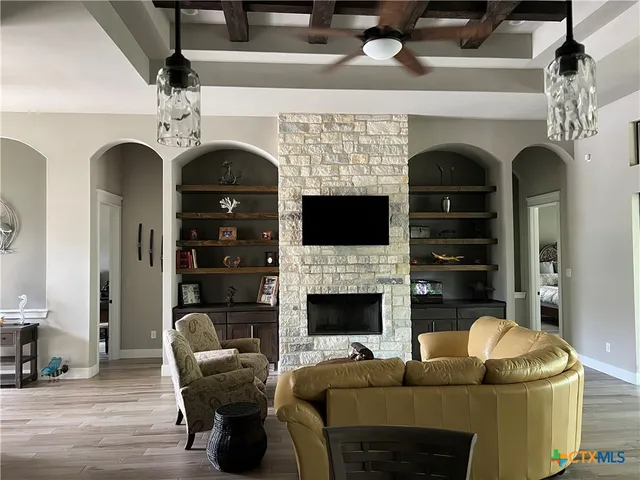 a living room with a wooden floor