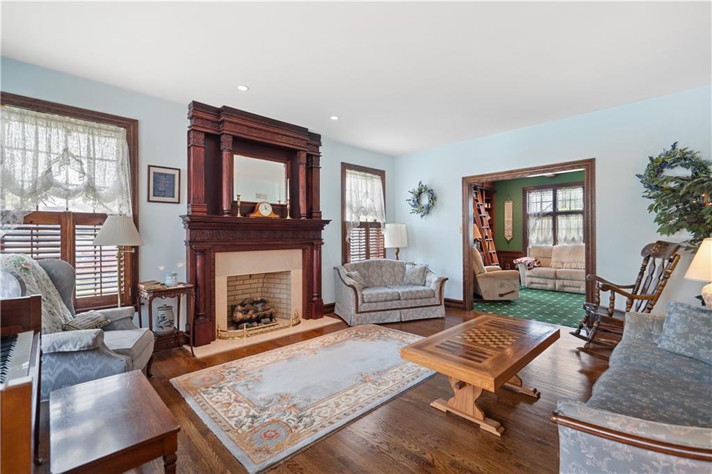 243 Clark Road Perryopolis, PA 15473 - Photo 8 of 45 a living room with furniture fireplace and window