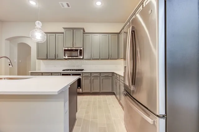 wooden floor in a hall with an entryway
