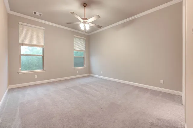 a hallway with a piano and wooden floor