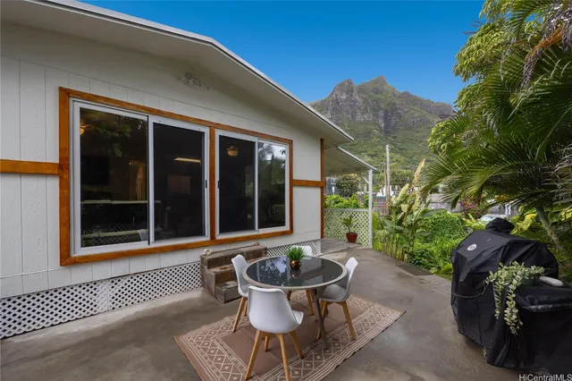 a view of a two chair in the patio