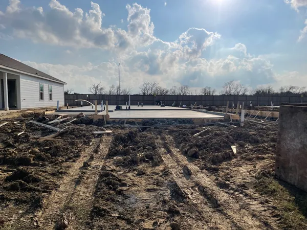 a view of a parking area with lots of trees