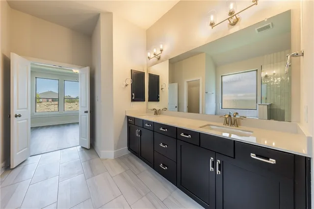 a white bath tub sitting next to a window