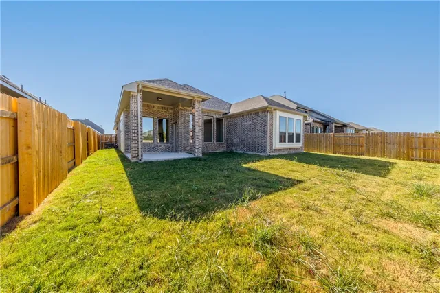 a view of a house with a swimming pool