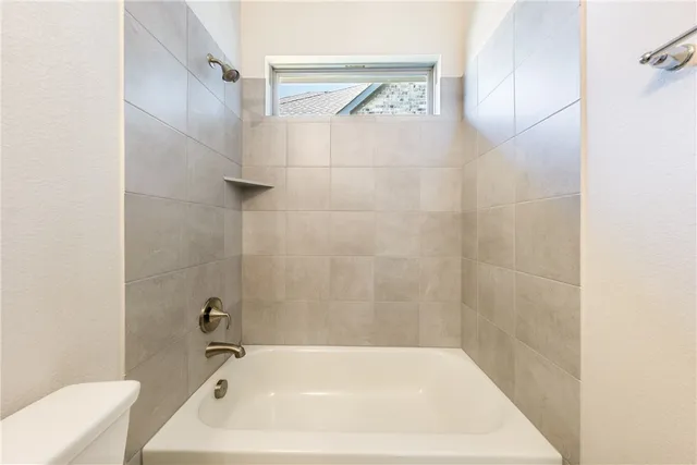 a bathroom with a bathtub