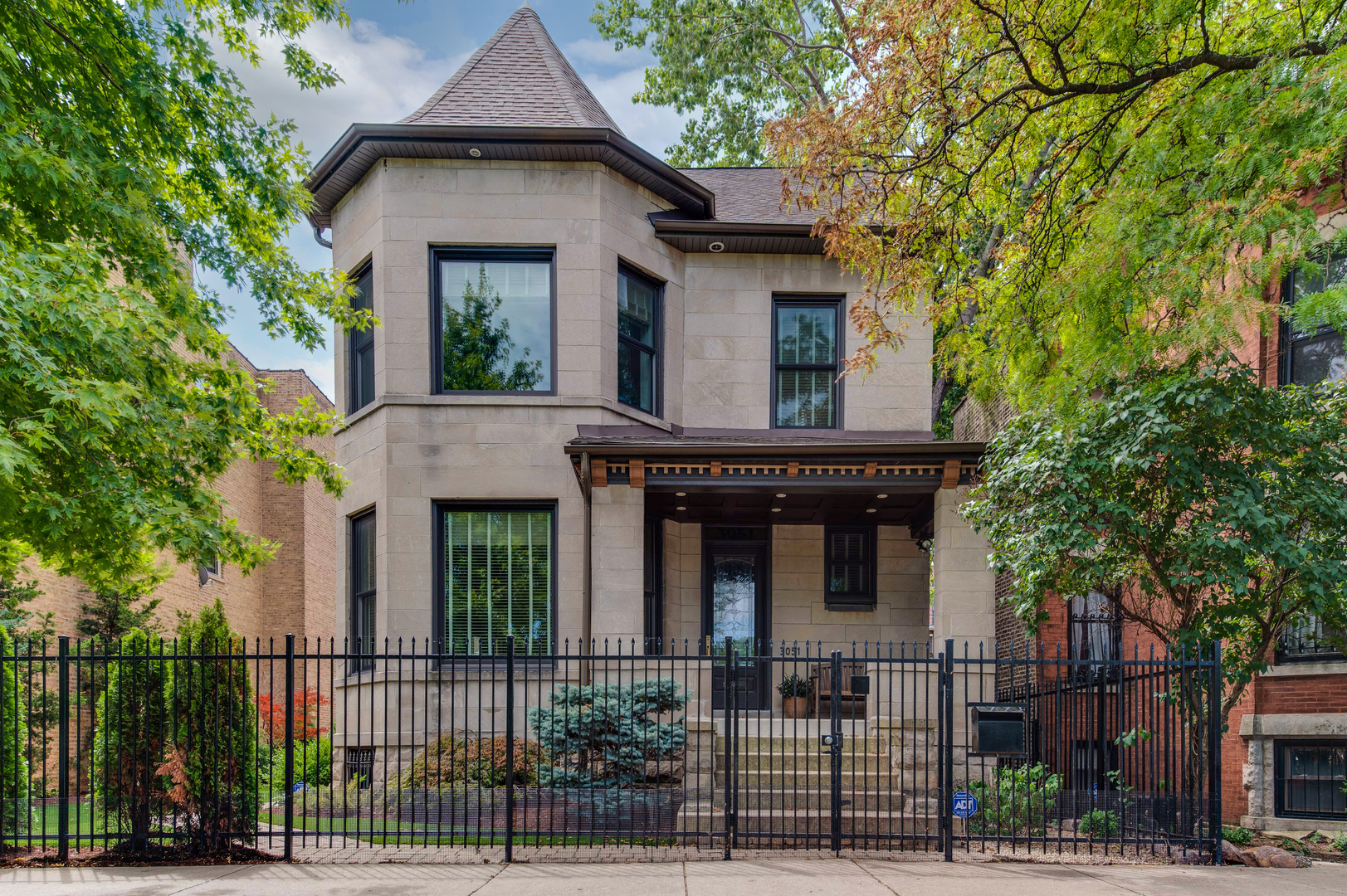 front view of a house with a small yard