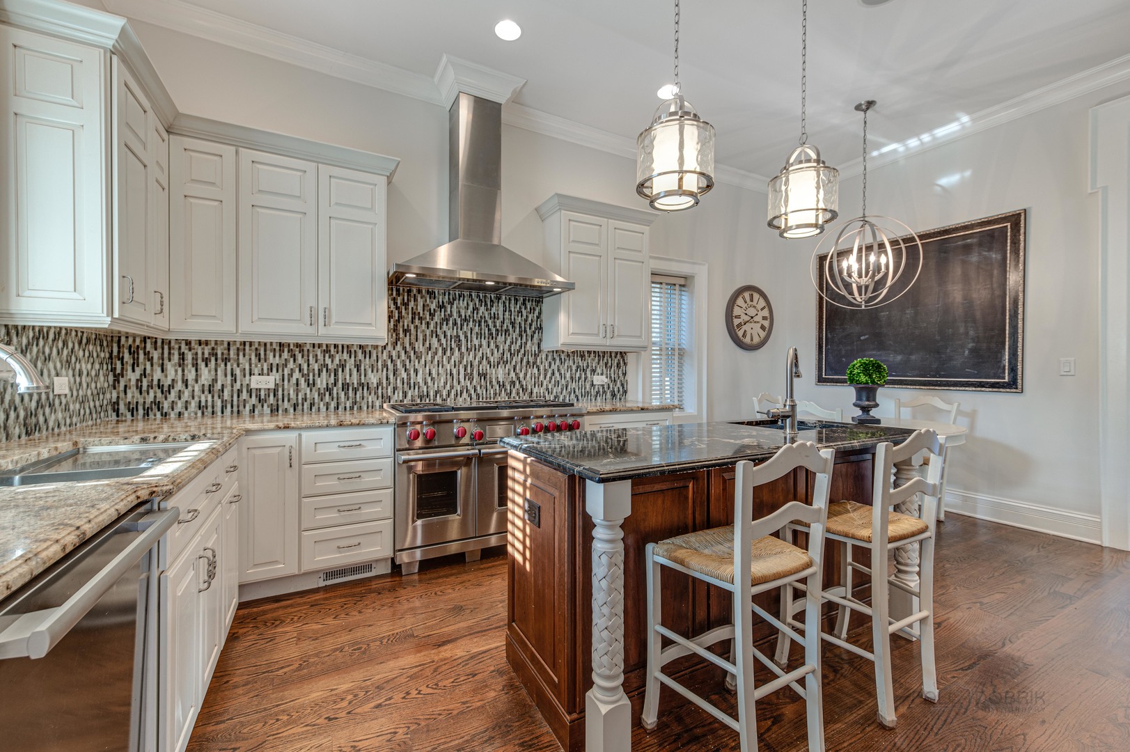 3051 West Logan Boulevard Chicago, IL 60647 - Photo 16 of 52 a kitchen with a counter space cabinets and stainless steel appliances