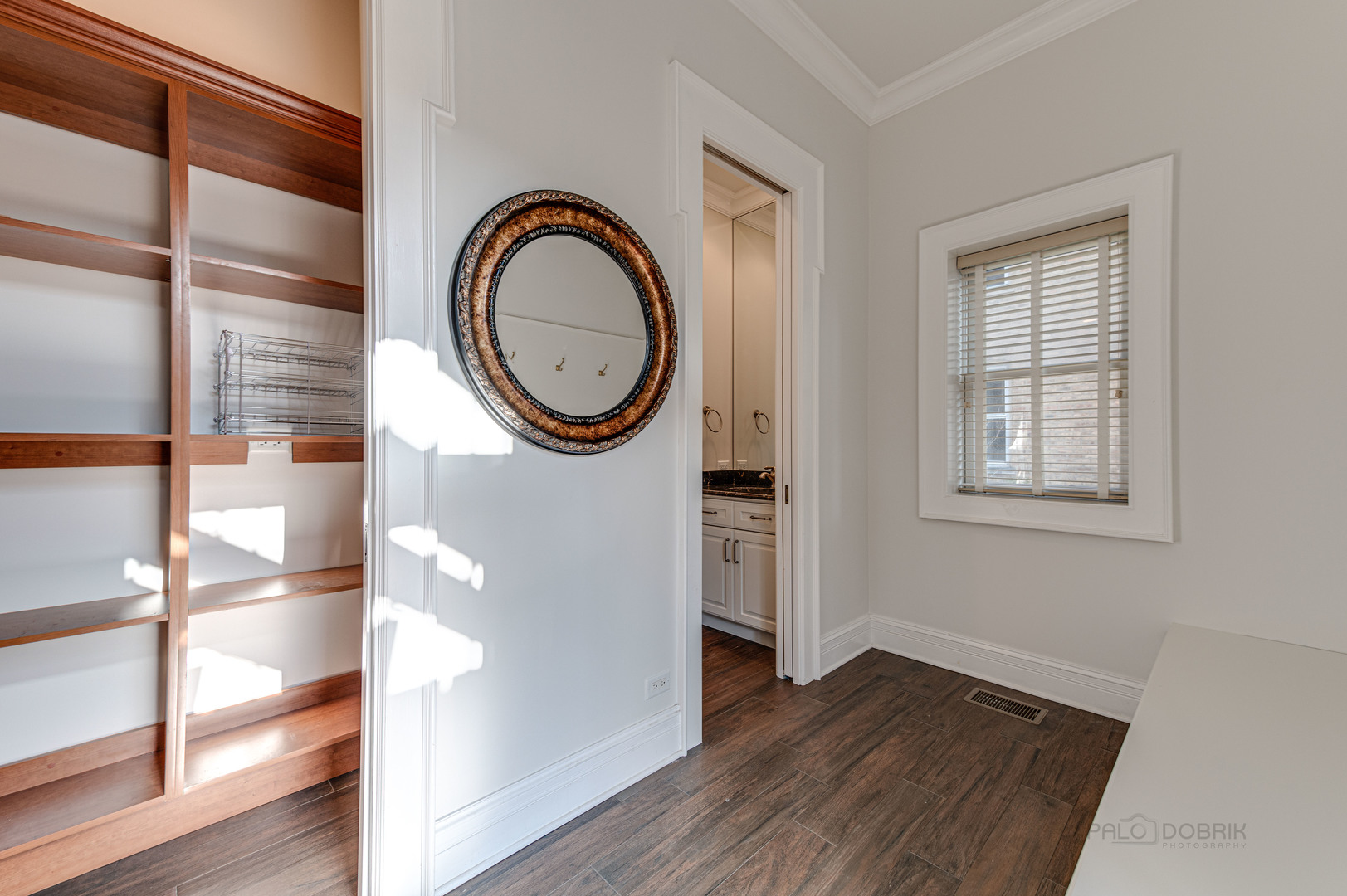 3051 West Logan Boulevard Chicago, IL 60647 - Photo 19 of 52 a view of a hallway with wooden floor and entryway