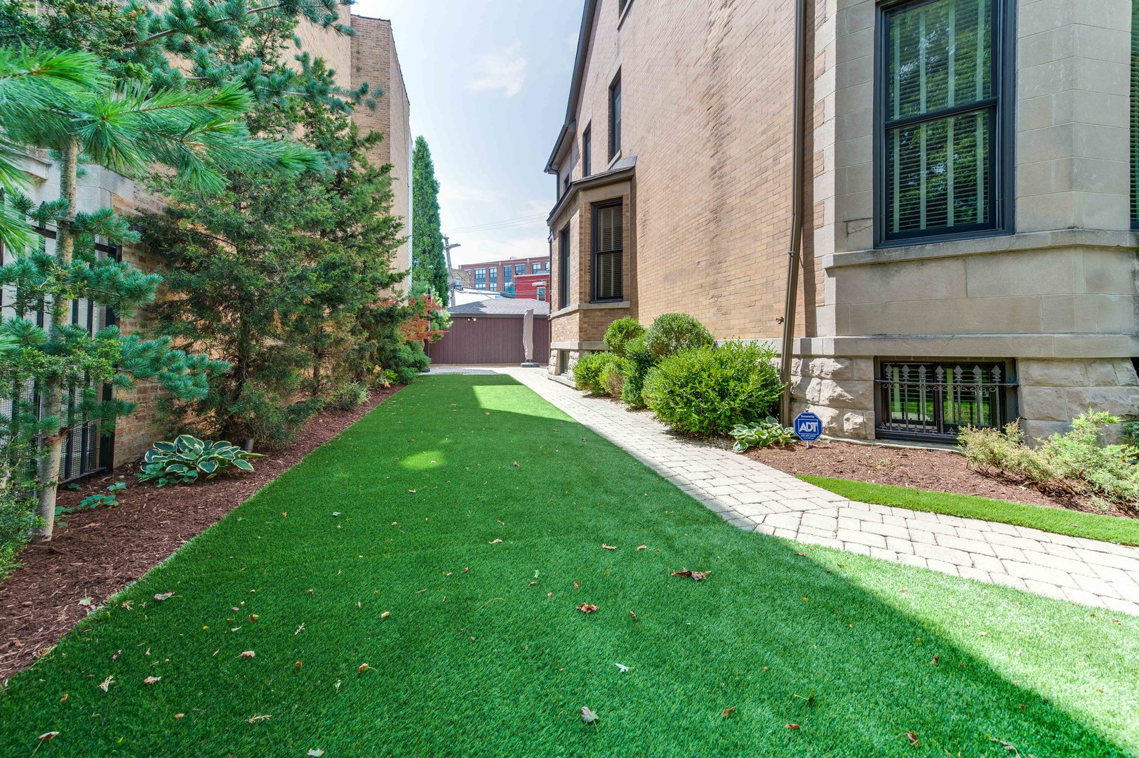 3051 West Logan Boulevard Chicago, IL 60647 - Photo 2 of 52 a view of a yard in front of house