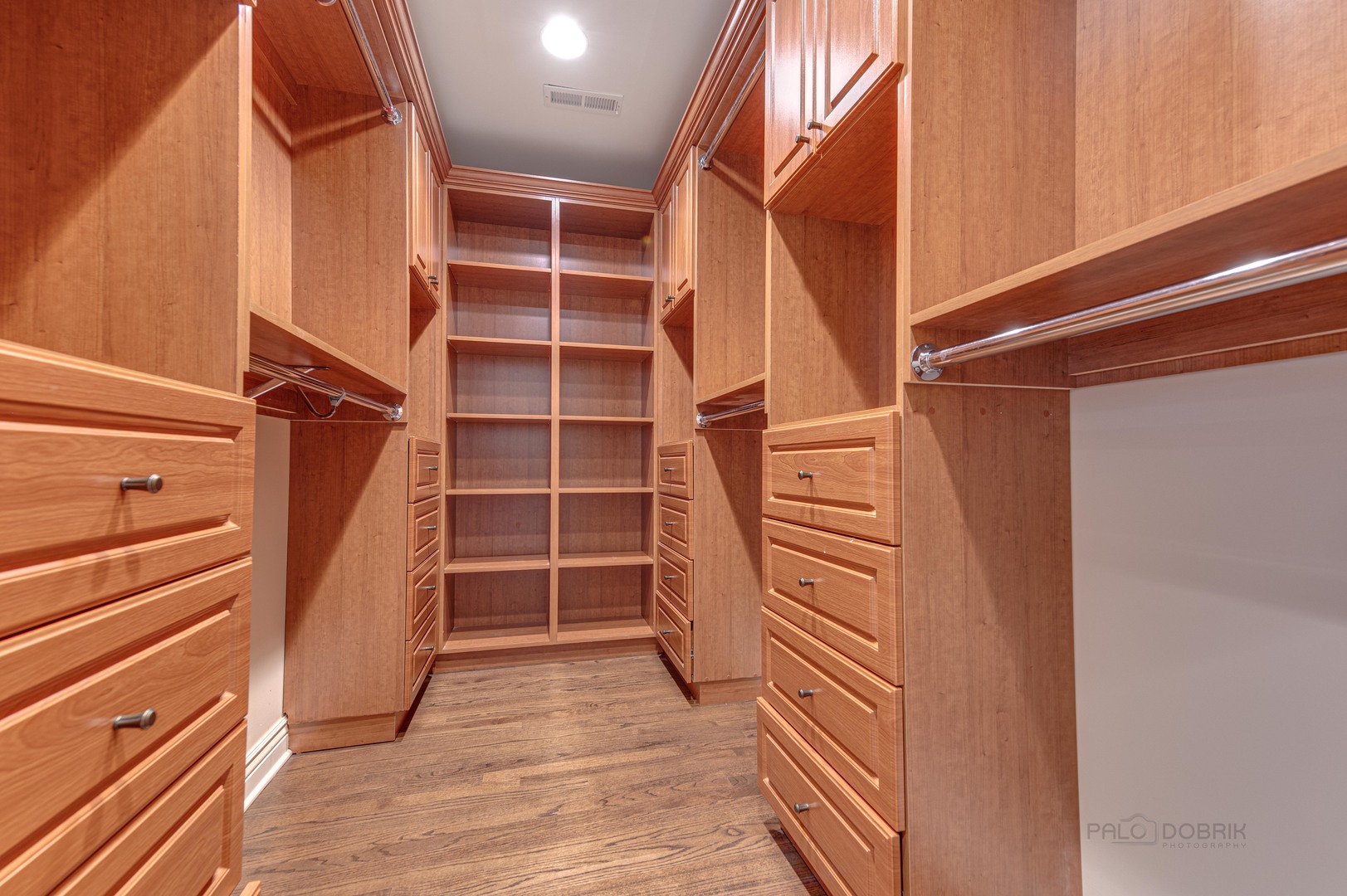 3051 West Logan Boulevard Chicago, IL 60647 - Photo 24 of 52 a view of walk in closet with empty racks