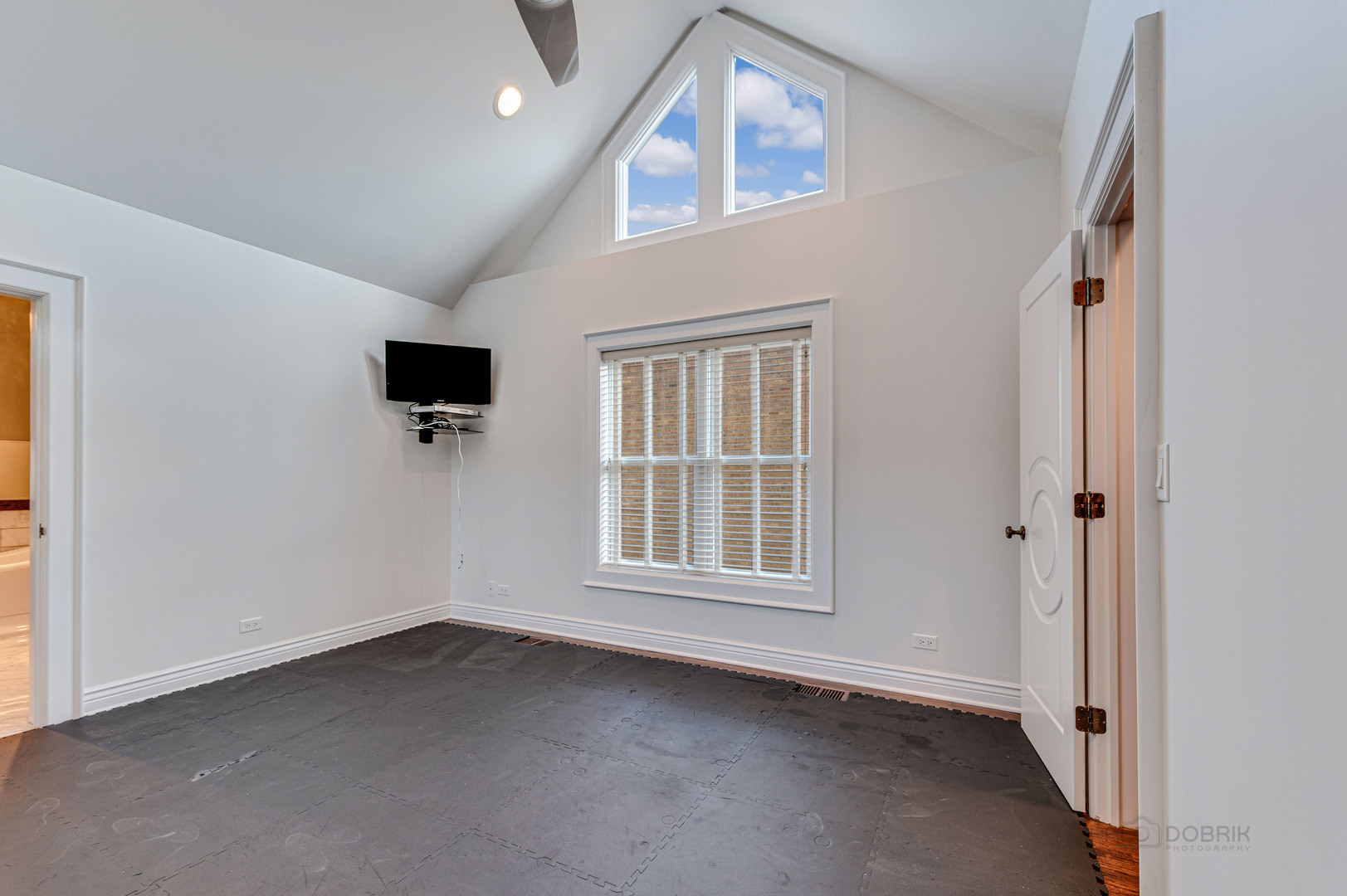 3051 West Logan Boulevard Chicago, IL 60647 - Photo 34 of 52 an empty room with windows and fireplace
