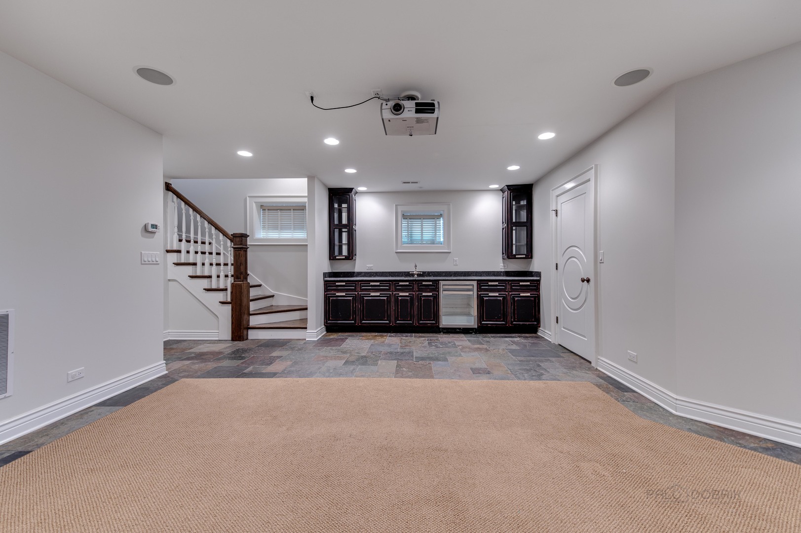 3051 West Logan Boulevard Chicago, IL 60647 - Photo 39 of 52 a view of a kitchen with a sink and a chandelier