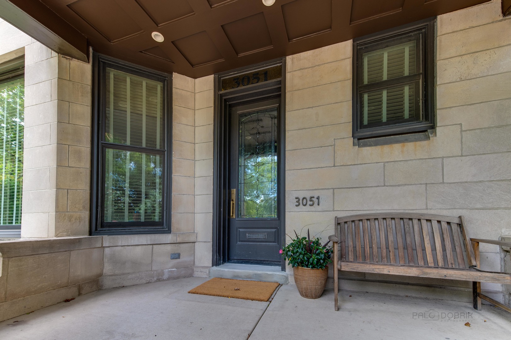 3051 West Logan Boulevard Chicago, IL 60647 - Photo 4 of 52 a view of porch with a bench
