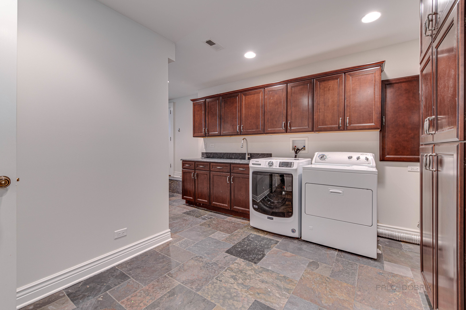 3051 West Logan Boulevard Chicago, IL 60647 - Photo 43 of 52 a utility room with washer and dryer