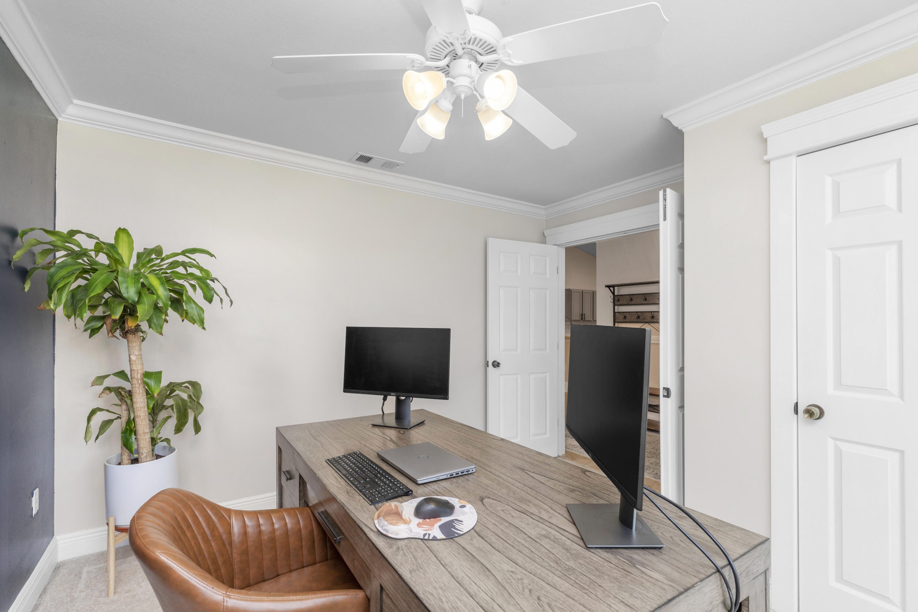 50 Bayou Landing Road Santa Rosa Beach, FL 32459 - Photo 23 of 40 a living room with furniture and a flat screen tv