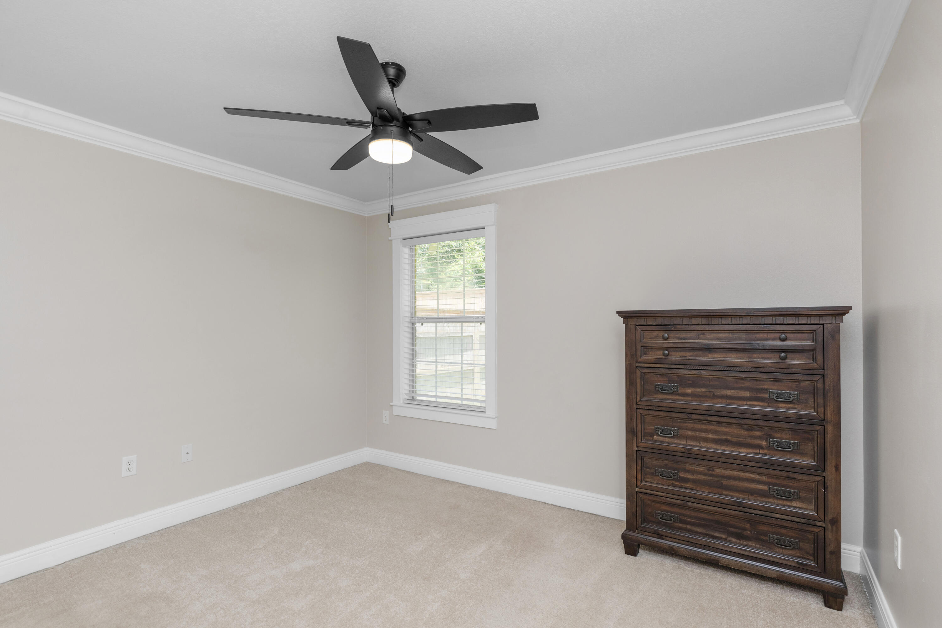 50 Bayou Landing Road Santa Rosa Beach, FL 32459 - Photo 27 of 40 an empty room with windows and fan