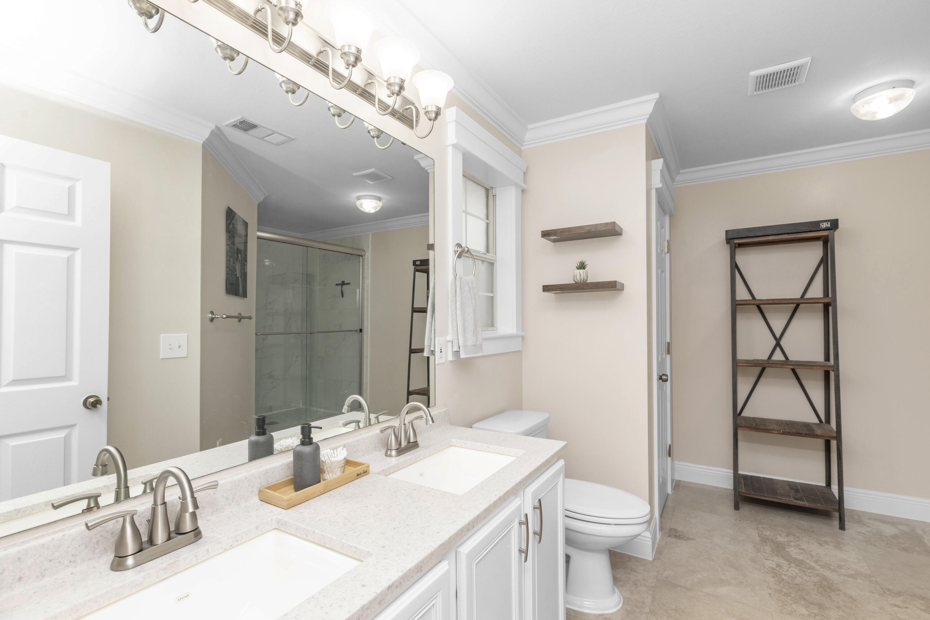 50 Bayou Landing Road Santa Rosa Beach, FL 32459 - Photo 32 of 40 a bathroom with a sink toilet and shower