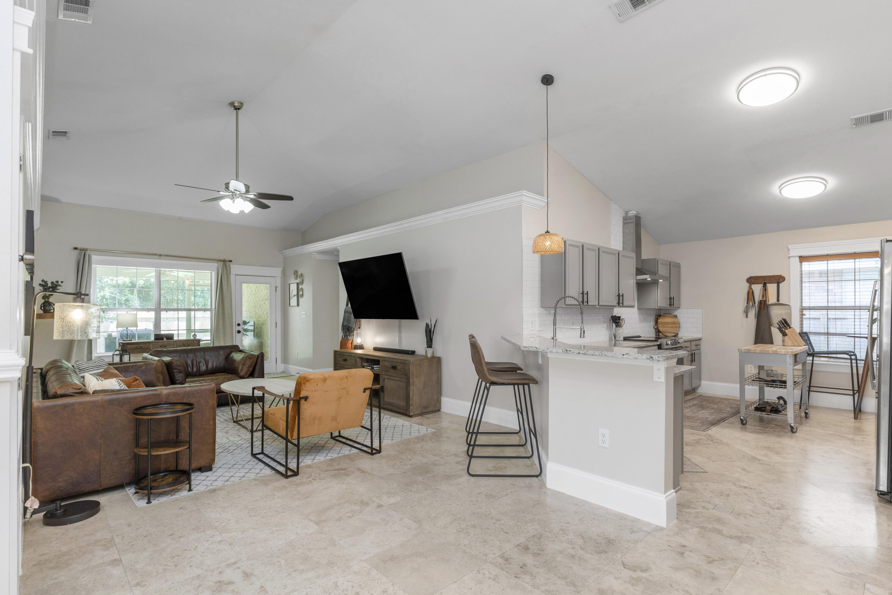 50 Bayou Landing Road Santa Rosa Beach, FL 32459 - Photo 7 of 40 a living room with furniture and a flat screen tv