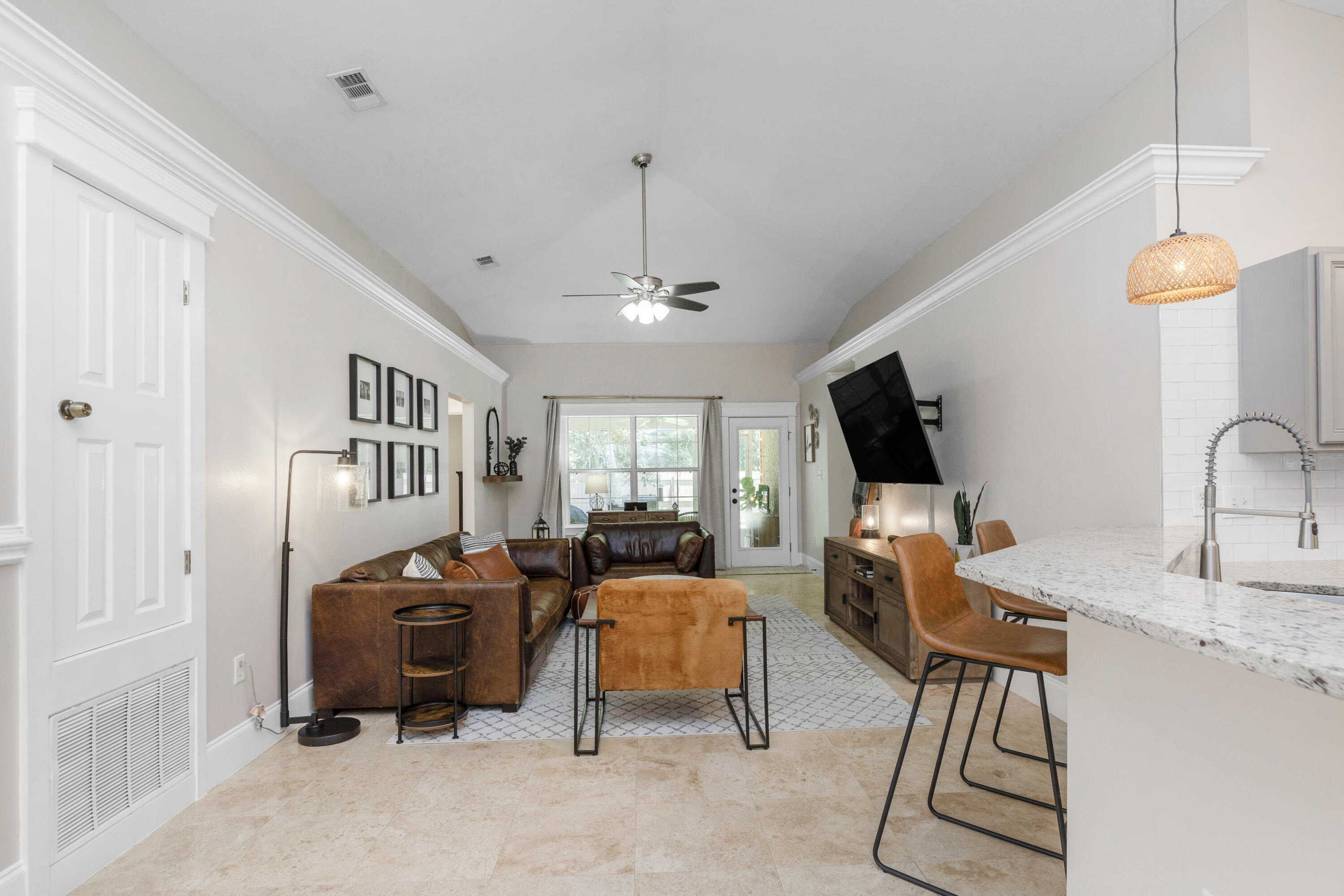 50 Bayou Landing Road Santa Rosa Beach, FL 32459 - Photo 8 of 40 a bedroom with furniture a flat screen tv and a window